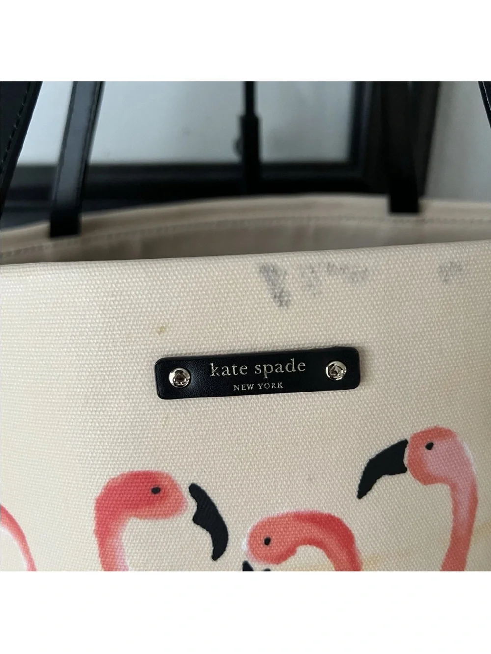 Canvas Flamingo Tote Bag with Black Trim see all pictures. It has black marks.
